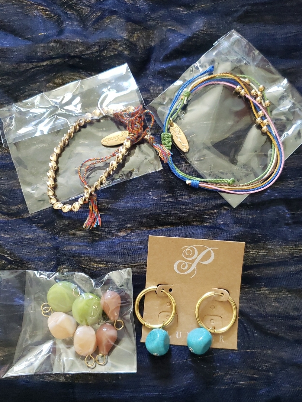 NWT- Interchangeable Earrings And Two Adjustable Bracelets